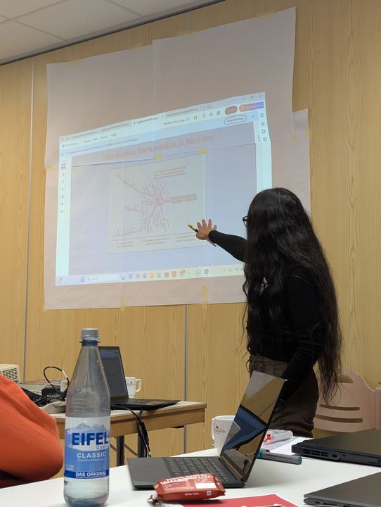 Lekshmi lecturing on information transmission in neurons